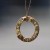 Gold Circle Necklace with Unique Diamonds