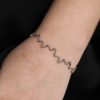 Swirl White Gold Diamond Bracelet