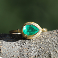 Small Teardrop Emerald Ring with Diamond Halo Image