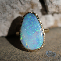 Teardrop Vertical Boulder Opal All Gold Ring Image
