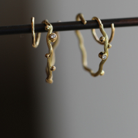 Medium 18k Yellow Gold Twisted Hoop Earrings with Diamonds Image