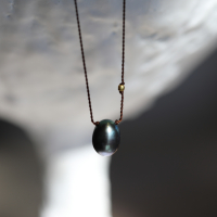 Black Pearl with 18k Gold Bead Nylon Cord Necklace Image